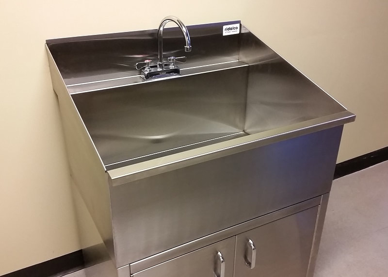 commercial kitchen sink with cabinet